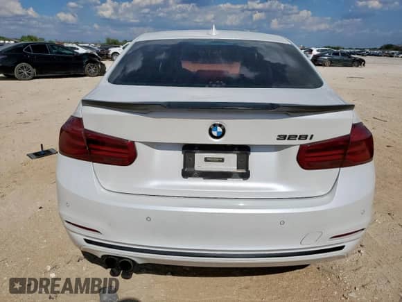 2016 BMW 3 Series 328i with VIN WBA8E9C59GK648044, listed as a Copart auction lot 71365925 with 96,136 mi miles and Salvage title. Bid and sale history available at DreamBid. Image 6.