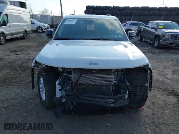 2023 Jeep Grand Cherokee Laredo with VIN 1C4RJHAG0PC548572, listed as a IAAI auction lot 41671833 with 28,446 mi miles and . Bid and sale history available at DreamBid. Image 13.