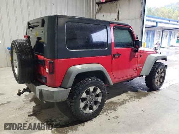 2009 Jeep Wrangler X с VIN 1J4FA24109L733404, выставлен на аукционе Copart как лот 82075825 с пробегом 149 544 миль миль и Списание • Salvage title. История ставок и продаж доступна на DreamBid. Изображение 3.