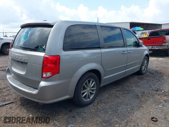 2014 Dodge Grand Caravan SE with VIN 2C4RDGBG6ER407705, listed as a IAAI auction lot 42898439 with 150,074 mi miles and . Bid and sale history available at DreamBid. Image 4.