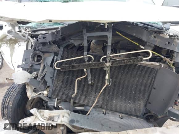 2014 Chevrolet Express Cargo z VIN 1GCWGFCB1E1113057, wystawiony jako IAAI lot #41913600 z przebiegiem 196 605 mil mil oraz . Historia ofert i sprzedaży dostępna na DreamBid. Obrazek 10.