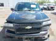 2011 Chevrolet Colorado 1LT z VIN 1GCHTCFE7B8136127, wystawiony jako IAAI lot #43083805 z przebiegiem 130 785 mil mil oraz . Historia ofert i sprzedaży dostępna na DreamBid. Obrazek 12.