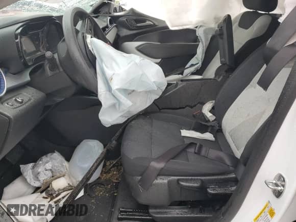 2024 Chevrolet Trax LS with VIN KL77LFE21RC097110, listed as a Copart auction lot 70520975 with Not provided miles and Salvage title. Bid and sale history available at DreamBid. Image 7.