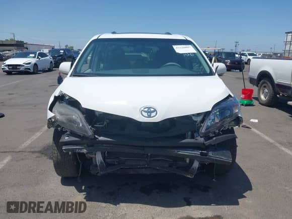 2014 Toyota Sienna SE with VIN 5TDXK3DC0ES515325, listed as a IAAI auction lot 42520007 with 155,649 mi miles and . Bid and sale history available at DreamBid. Image 13.