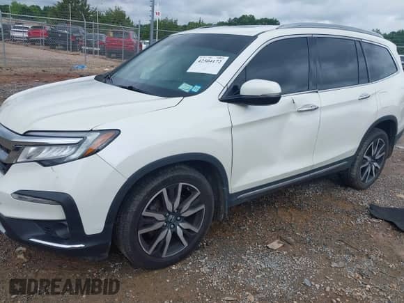 2019 Honda Pilot Touring 7-Passenger z VIN 5FNYF6H63KB078886, wystawiony jako IAAI lot #42504172 z przebiegiem 87 662 mil mil oraz . Historia ofert i sprzedaży dostępna na DreamBid. Obrazek 19.