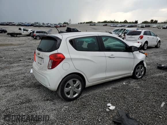 2020 Chevrolet Spark LS z VIN KL8CB6SAXLC460424, wystawiony jako Copart lot #69800585 z przebiegiem Nie podano mil oraz Szkoda całkowita • Salvage title. Historia ofert i sprzedaży dostępna na DreamBid. Obrazek 3.
