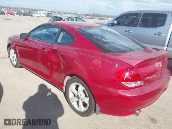2005 Hyundai Tiburon GS с VIN KMHHM65D85U162136, выставлен на аукционе IAAI как лот 41330951 с пробегом 120 061 миль миль и . История ставок и продаж доступна на DreamBid. Изображение 3.