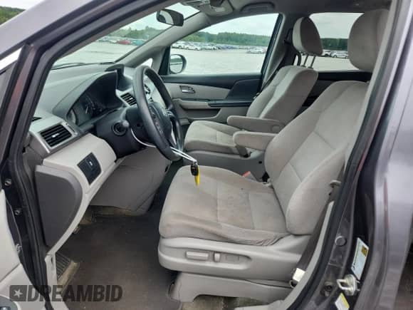 2015 Honda Odyssey LX with VIN 5FNRL5H24FB115888, listed as a Copart auction lot 68158785 with 139,233 mi miles and Salvage title. Bid and sale history available at DreamBid. Image 7.