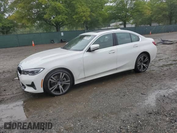2022 BMW 3 Series 330i xDrive with VIN 3MW5R7J01N8C43605, listed as a Copart auction lot 83750295 with 19,757 mi miles and Salvage title. Bid and sale history available at DreamBid. Image 1.