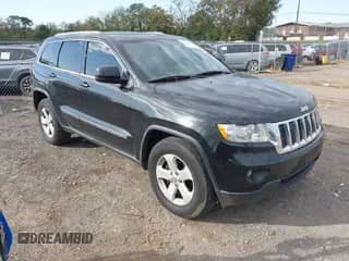 2012 Jeep Grand Cherokee Laredo z VIN 1C4RJEAG2CC258519, wystawiony jako IAAI lot #43517274 z przebiegiem 187 354 mil mil oraz . Historia ofert i sprzedaży dostępna na DreamBid. Obrazek 1.