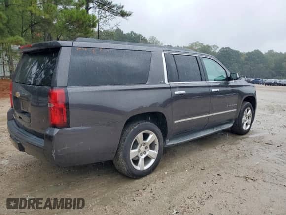2015 Chevrolet Suburban LT z VIN 1GNSCJKC9FR548894, wystawiony jako Copart lot #81880935 z przebiegiem 161 389 mil mil oraz Szkoda całkowita • Salvage title. Historia ofert i sprzedaży dostępna na DreamBid. Obrazek 3.