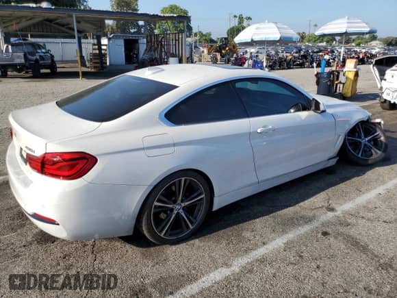 2019 BMW 4 Series 430i with VIN WBA4W3C52KAF92877, listed as a Copart auction lot 69134145 with 92,312 mi miles and Salvage title. Bid and sale history available at DreamBid. Image 3.