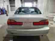 2000 Honda Accord LX z VIN 1HGCG6554YA106930, wystawiony jako Copart lot #67472525 z przebiegiem 81 742 mil mil oraz Szkoda całkowita • Salvage title. Historia ofert i sprzedaży dostępna na DreamBid. Obrazek 6.