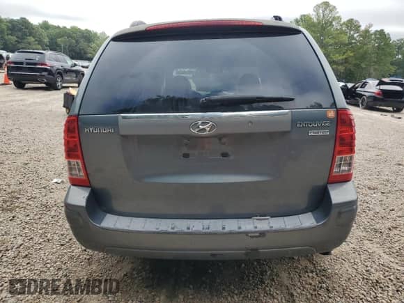 2007 Hyundai Entourage GLS with VIN KNDMC233376023404, listed as a Copart auction lot 69413625 with 135,989 mi miles and Salvage title. Bid and sale history available at DreamBid. Image 6.