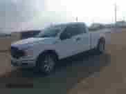 2020 Ford F-150 XL with VIN 1FTFX1E51LKF58027, listed as a IAAI auction lot 41207102 with 162,736 mi miles and . Bid and sale history available at DreamBid. Image 2.