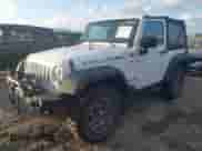 2015 Jeep Wrangler Rubicon z VIN 1C4BJWCG0FL562795, wystawiony jako IAAI lot #41207703 z przebiegiem 97 922 mil mil oraz . Historia ofert i sprzedaży dostępna na DreamBid. Obrazek 2.