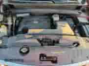 2014 Nissan Pathfinder SV z VIN 5N1AR2MN8EC669355, wystawiony jako Copart lot #70698575 z przebiegiem 245 053 mil mil oraz Szkoda całkowita • Salvage title. Historia ofert i sprzedaży dostępna na DreamBid. Obrazek 11.