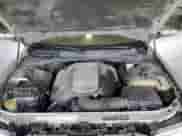 2005 Chrysler 300 300C AWD with VIN 2C3AK63H65H638909, listed as a Copart auction lot 81298895 with 237,011 mi miles and Salvage title. Bid and sale history available at DreamBid. Image 11.