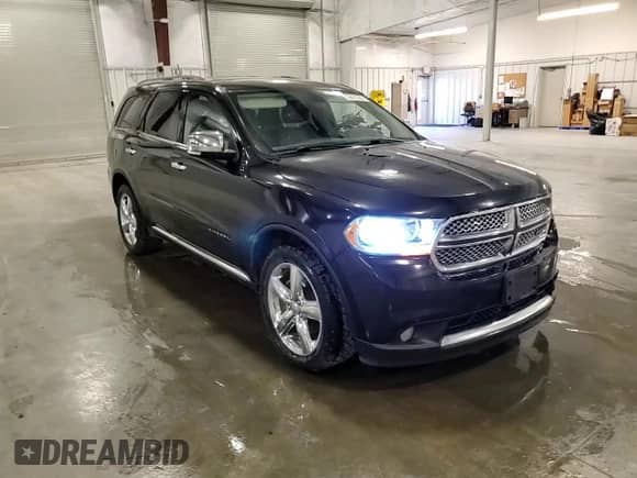 2012 Dodge Durango Citadel z VIN 1C4SDJET2CC311907, wystawiony jako Copart lot #80867905 z przebiegiem 185 918 mil mil oraz Szkoda całkowita • Salvage title. Historia ofert i sprzedaży dostępna na DreamBid. Obrazek 14.