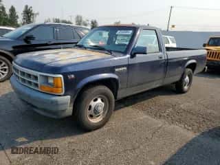 1994 Dodge Dakota z VIN 1B7FL26XXRS606540, wystawiony jako Copart lot #70103064 z przebiegiem 123 850 mil mil oraz Czysty tytuł • Clean title. Historia ofert i sprzedaży dostępna na DreamBid. Obrazek 1.