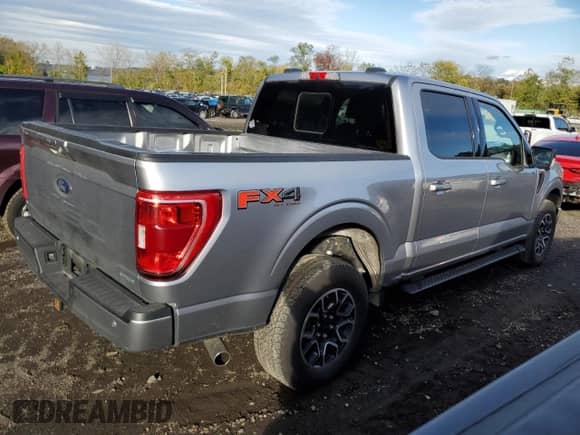 2022 Ford F-150 XL с VIN 1FTFW1E84NFA57674, выставлен на аукционе Copart как лот 86633375 с пробегом 151 927 миль миль и Чистый • Clean title. История ставок и продаж доступна на DreamBid. Изображение 3.