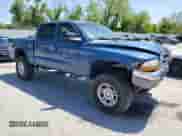 2004 Dodge Dakota SLT z VIN 1D7HG48N24S563945, wystawiony jako Copart lot #55990595 z przebiegiem 169 684 mil mil oraz Szkoda całkowita • Salvage title. Historia ofert i sprzedaży dostępna na DreamBid. Obrazek 4.