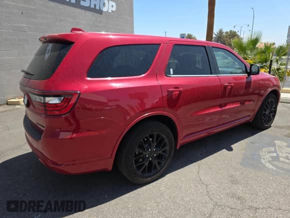 2015 Dodge Durango Limited with VIN 1C4RDJDGXFC881242, listed as a Copart auction lot 60501515 with 129,089 mi miles and Clean title. Bid and sale history available at DreamBid. Image 4.