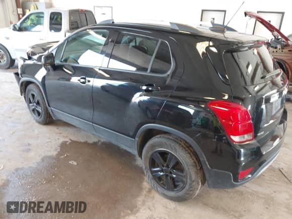 2021 Chevrolet Trax LT z VIN KL7CJLSB4MB330063, wystawiony jako IAAI lot #42957840 z przebiegiem 59 325 mil mil oraz . Historia ofert i sprzedaży dostępna na DreamBid. Obrazek 3.