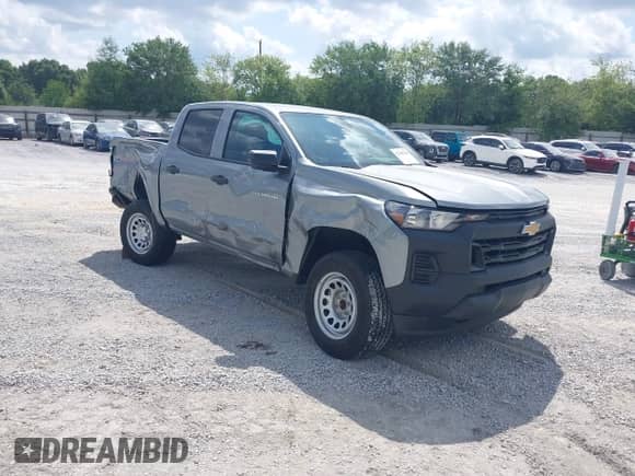 2023 Chevrolet Colorado 4WD Work Truck z VIN 1GCPTBEK7P1112228, wystawiony jako IAAI lot #42308344 z przebiegiem 12 668 mil mil oraz . Historia ofert i sprzedaży dostępna na DreamBid. Obrazek 1.