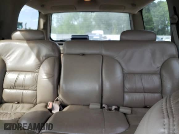 1998 Chevrolet Tahoe z VIN 1GNEK13R7WJ348565, wystawiony jako Copart lot #53375725 z przebiegiem 176 919 mil mil oraz Szkoda całkowita • Salvage title. Historia ofert i sprzedaży dostępna na DreamBid. Obrazek 10.