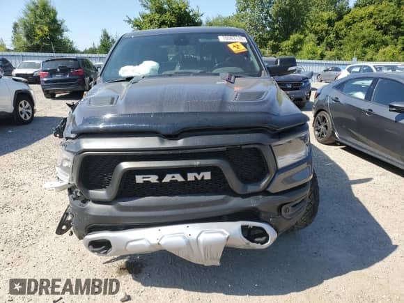 2020 Ram 1500 Rebel z VIN 1C6SRFLT0LN233317, wystawiony jako Copart lot #70363135 z przebiegiem 124 850 mil mil oraz Szkoda całkowita • Salvage title. Historia ofert i sprzedaży dostępna na DreamBid. Obrazek 5.