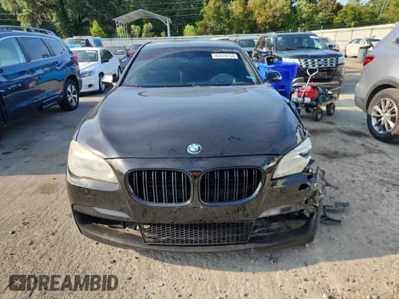 2013 BMW 7 Series 750Li с VIN WBAYE8C51DDE22061, выставлен на аукционе Copart как лот 63578755 с пробегом 137 192 миль миль и Списание • Salvage title. История ставок и продаж доступна на DreamBid. Изображение 5.