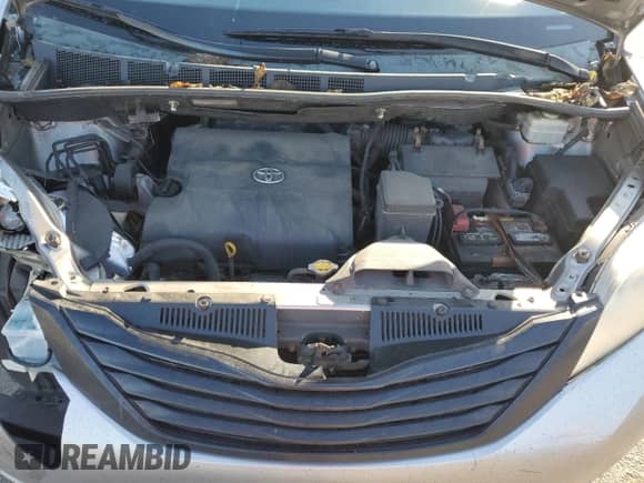 2012 Toyota Sienna with VIN 5TDZK3DC3CS210035, listed as a Copart auction lot 83798255 with 319,065 mi miles and Salvage title. Bid and sale history available at DreamBid. Image 12.