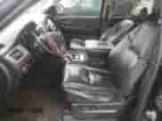 2009 Cadillac Escalade z VIN 1GYFC23209R280516, wystawiony jako Copart lot #74674954 z przebiegiem 195 818 mil mil oraz Czysty tytuł • Clean title. Historia ofert i sprzedaży dostępna na DreamBid. Obrazek 7.