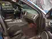 2014 Jeep Grand Cherokee SRT-8 z VIN 1C4RJFDJ0EC497826, wystawiony jako IAAI lot #38543666 z przebiegiem 79 937 mil mil oraz . Historia ofert i sprzedaży dostępna na DreamBid. Obrazek 5.