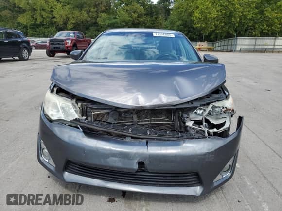 2013 Toyota Camry LE z VIN 4T1BD1FK0DU080437, wystawiony jako Copart lot #71326805 z przebiegiem 214 631 mil mil oraz Szkoda całkowita • Salvage title. Historia ofert i sprzedaży dostępna na DreamBid. Obrazek 5.