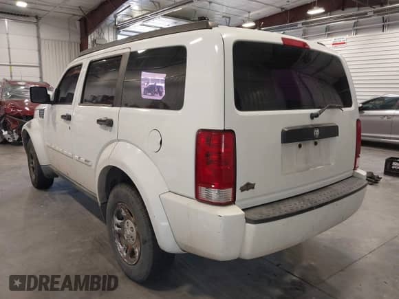 2011 Dodge Nitro SE with VIN 1D4PT2GK6BW590233, listed as a IAAI auction lot 42778691 with 233,652 mi miles and . Bid and sale history available at DreamBid. Image 3.