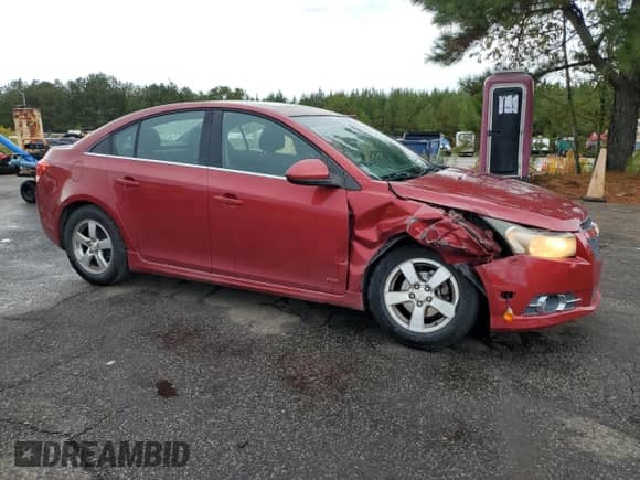 2012 Chevrolet Cruze 1LT with VIN 1G1PF5SC8C7330796, listed as a Copart auction lot 84421745 with 151,557 mi miles and Salvage title. Bid and sale history available at DreamBid. Image 4.