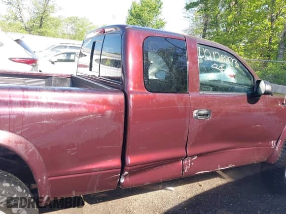 2004 Dodge Dakota with VIN 1D7HG12K74S646915, listed as a IAAI auction lot 42126273 with 202,085 mi miles and . Bid and sale history available at DreamBid. Image 14.