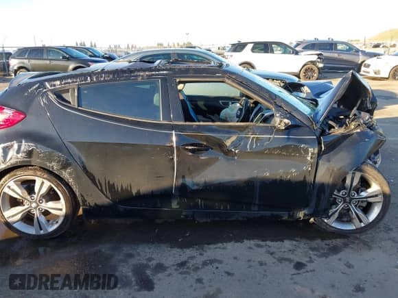 2014 Hyundai Veloster with VIN KMHTC6AD3EU184600, listed as a IAAI auction lot 41300088 with Not provided miles and . Bid and sale history available at DreamBid. Image 13.