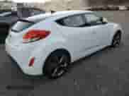 2016 Hyundai Veloster с VIN KMHTC6AD0GU298346, выставлен на аукционе Copart как лот 81289574 с пробегом 87 540 миль миль и Списание • Salvage title. История ставок и продаж доступна на DreamBid. Изображение 3.