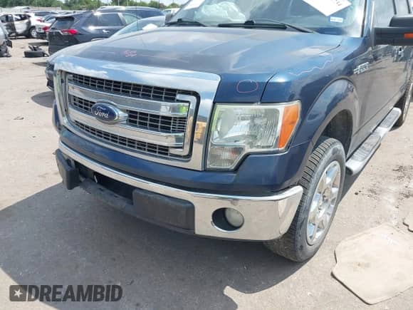 2013 Ford F-150 XL with VIN 1FTFW1CF9DKD89228, listed as a IAAI auction lot 42949734 with 212,436 mi miles and . Bid and sale history available at DreamBid. Image 6.