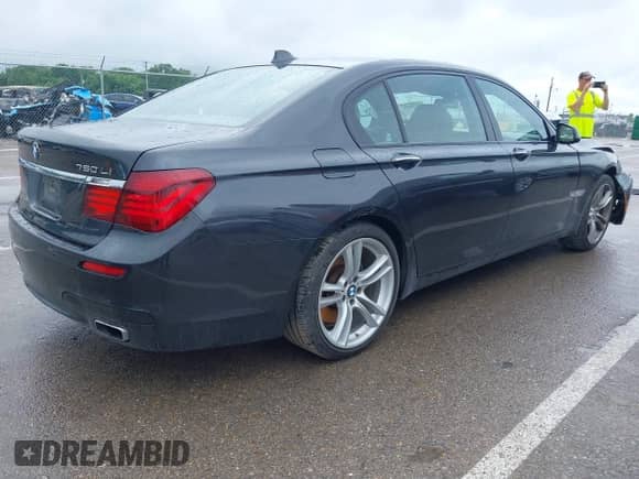 2013 BMW 7 Series 750Li with VIN WBAYE8C5XDD132883, listed as a IAAI auction lot 42470274 with 96,047 mi miles and . Bid and sale history available at DreamBid. Image 4.