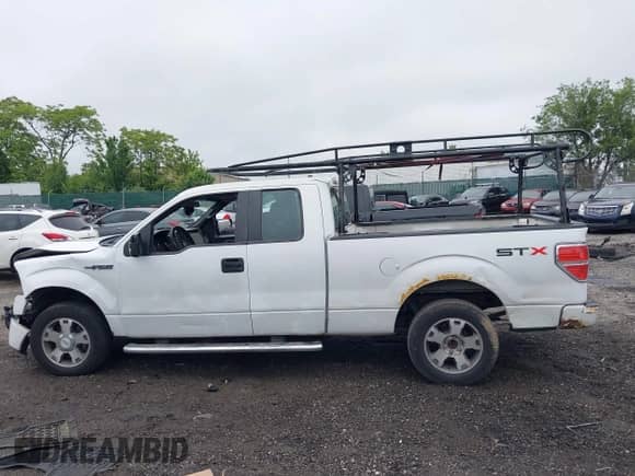 2010 Ford F-150 XL with VIN 1FTEX1CW4AFC14348, listed as a IAAI auction lot 42381042 with Not provided miles and . Bid and sale history available at DreamBid. Image 15.