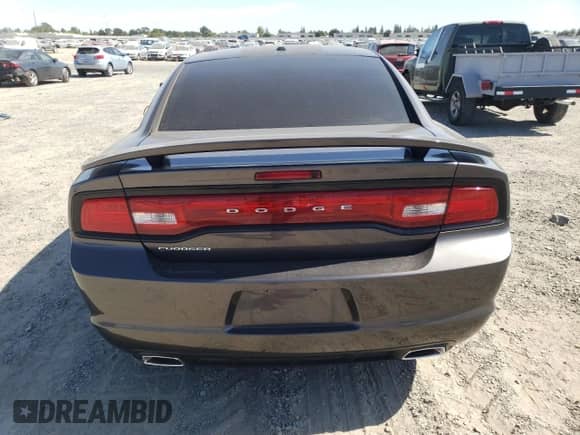 2013 Dodge Charger SXT Plus с VIN 2C3CDXHG5DH619209, выставлен на аукционе Copart как лот 66178325 с пробегом 104 464 миль миль и Списание • Salvage title. История ставок и продаж доступна на DreamBid. Изображение 6.
