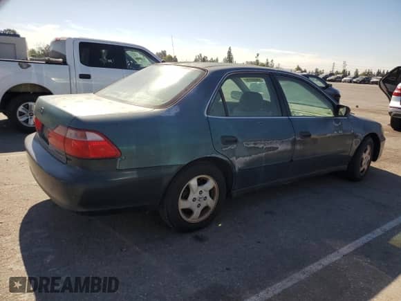 1998 Honda Accord EX с VIN 1HGCG6671WA234054, выставлен на аукционе Copart как лот 69502275 с пробегом 112 818 миль миль и Чистый • Clean title. История ставок и продаж доступна на DreamBid. Изображение 3.