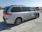 2012 Toyota Sienna XLE with VIN 5TDYK3DC9CS207913, listed as a Copart auction lot 82689705 with 188,992 mi miles and Salvage title. Bid and sale history available at DreamBid. Image 3.