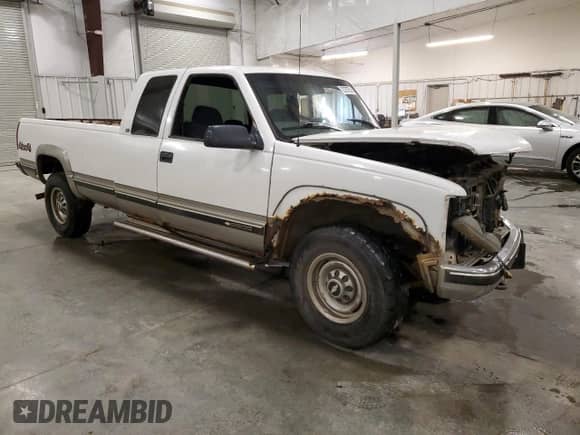 1998 Chevrolet Silverado 2500 with VIN 1GCGK29J0WE209704, listed as a Copart auction lot 72757704 with 253,031 mi miles and Salvage title. Bid and sale history available at DreamBid. Image 4.