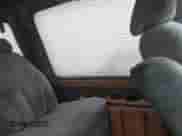 1999 Ford Econoline Cargo Recreational with VIN 1FDRE14L4XHA56517, listed as a IAAI auction lot 42186104 with 200,382 mi miles and . Bid and sale history available at DreamBid. Image 8.