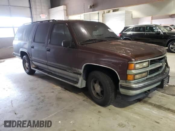 1997 Chevrolet Suburban с VIN 1GNEC16R1VJ352537, выставлен на аукционе Copart как лот 74200024 с пробегом Не указан миль и На запчасти • Non repairable. История ставок и продаж доступна на DreamBid. Изображение 4.